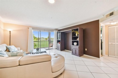 Just Listed!  **This is a second floor elevator accessible on Feather Sound Country Club in Florida - for sale on GolfHomes.com, golf home, golf lot