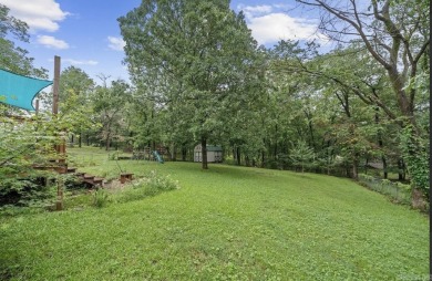 Peaceful Diamondhead Retreat with Golf Course Views  Sunroom on Diamondhead Golf and Country Club in Arkansas - for sale on GolfHomes.com, golf home, golf lot