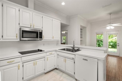 This comfortable 3-2.5-2 home with golf cart space is tucked on Nutcracker Golf Club in Texas - for sale on GolfHomes.com, golf home, golf lot