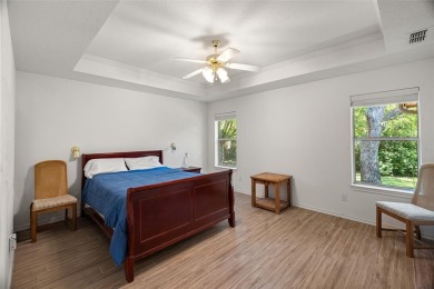 This comfortable 3-2.5-2 home with golf cart space is tucked on Nutcracker Golf Club in Texas - for sale on GolfHomes.com, golf home, golf lot