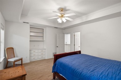 This comfortable 3-2.5-2 home with golf cart space is tucked on Nutcracker Golf Club in Texas - for sale on GolfHomes.com, golf home, golf lot