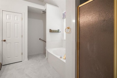 This comfortable 3-2.5-2 home with golf cart space is tucked on Nutcracker Golf Club in Texas - for sale on GolfHomes.com, golf home, golf lot