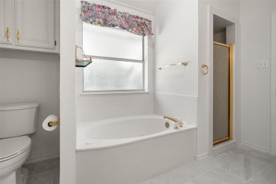 This comfortable 3-2.5-2 home with golf cart space is tucked on Nutcracker Golf Club in Texas - for sale on GolfHomes.com, golf home, golf lot