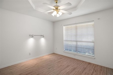 This comfortable 3-2.5-2 home with golf cart space is tucked on Nutcracker Golf Club in Texas - for sale on GolfHomes.com, golf home, golf lot