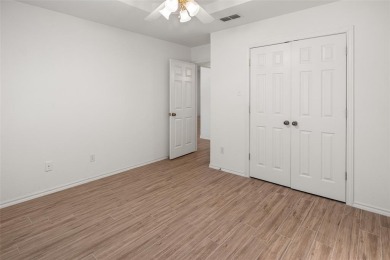 This comfortable 3-2.5-2 home with golf cart space is tucked on Nutcracker Golf Club in Texas - for sale on GolfHomes.com, golf home, golf lot