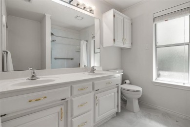 This comfortable 3-2.5-2 home with golf cart space is tucked on Nutcracker Golf Club in Texas - for sale on GolfHomes.com, golf home, golf lot
