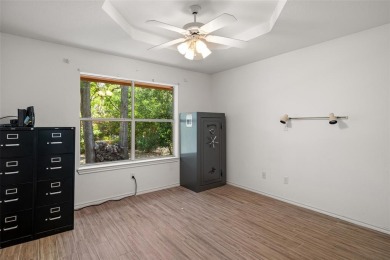 This comfortable 3-2.5-2 home with golf cart space is tucked on Nutcracker Golf Club in Texas - for sale on GolfHomes.com, golf home, golf lot