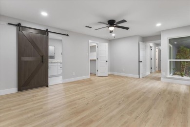 Welcome to 1208 W Red Bird Lane -- a fully renovated, corner-lot on The Golf Club of Dallas in Texas - for sale on GolfHomes.com, golf home, golf lot