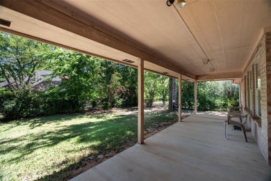 This comfortable 3-2.5-2 home with golf cart space is tucked on Nutcracker Golf Club in Texas - for sale on GolfHomes.com, golf home, golf lot