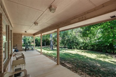 This comfortable 3-2.5-2 home with golf cart space is tucked on Nutcracker Golf Club in Texas - for sale on GolfHomes.com, golf home, golf lot