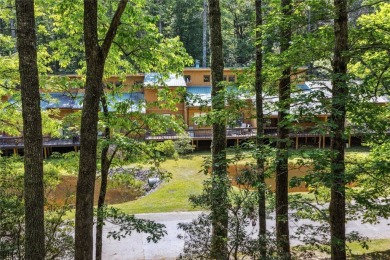 Nestled at the end of a quiet cul-de-sac in The Woods, this on The Country Club of Sapphire Valley in North Carolina - for sale on GolfHomes.com, golf home, golf lot
