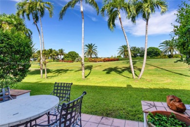 Enjoy sweeping golf course views from this spacious 3 bedroom, 2 on Riviera Country Club in Florida - for sale on GolfHomes.com, golf home, golf lot