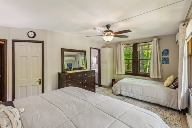 Nestled at the end of a quiet cul-de-sac in The Woods, this on The Country Club of Sapphire Valley in North Carolina - for sale on GolfHomes.com, golf home, golf lot