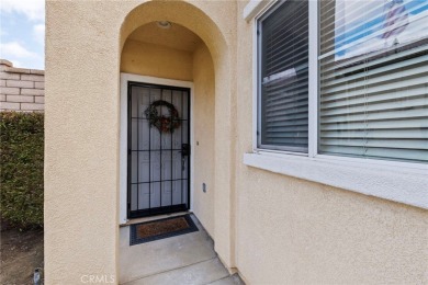 This beautiful single story home is in gate guarded 55+ on Menifee Lakes Country Club - Lakes in California - for sale on GolfHomes.com, golf home, golf lot