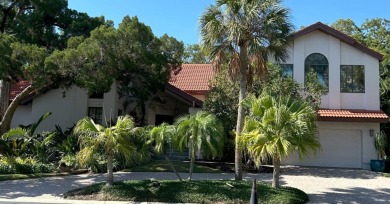 A rare opportunity to secure a residence in the Bay Isles Bayou on Longboat Key Golf Club in Florida - for sale on GolfHomes.com, golf home, golf lot