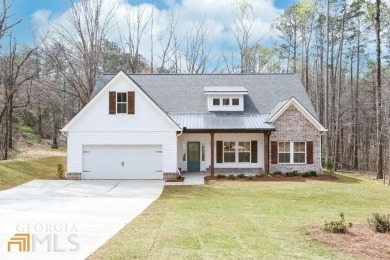 Introducing the perfect blend of modern luxury and serene on Fairfield Plantation Golf and Country Club in Georgia - for sale on GolfHomes.com, golf home, golf lot