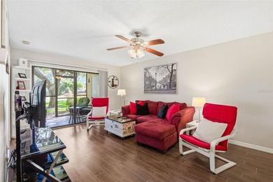 Welcome to this beautifully updated, furnished first-floor condo on St. Petersburg Country Club in Florida - for sale on GolfHomes.com, golf home, golf lot
