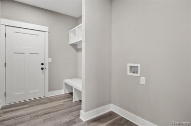 Home is currently being built with approximately 2-3 months on Copper Ridge Golf Club in Michigan - for sale on GolfHomes.com, golf home, golf lot