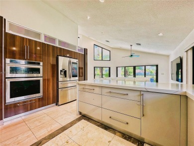 Cathedral Ceiling Single family Home for Sale located in the on Woodmont Country Club in Florida - for sale on GolfHomes.com, golf home, golf lot