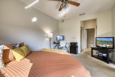This charming 3-bedroom, 2.5-bathroom home with a tastefully on PGA National Golf Club in Florida - for sale on GolfHomes.com, golf home, golf lot