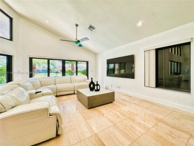 Cathedral Ceiling Single family Home for Sale located in the on Woodmont Country Club in Florida - for sale on GolfHomes.com, golf home, golf lot