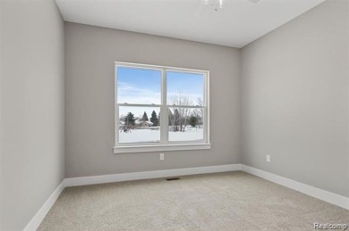 Home is currently being built with approximately 2-3 months on Copper Ridge Golf Club in Michigan - for sale on GolfHomes.com, golf home, golf lot