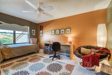 This charming 3-bedroom, 2.5-bathroom home with a tastefully on PGA National Golf Club in Florida - for sale on GolfHomes.com, golf home, golf lot