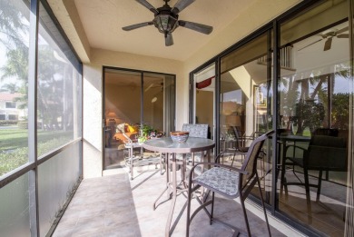 This charming 3-bedroom, 2.5-bathroom home with a tastefully on PGA National Golf Club in Florida - for sale on GolfHomes.com, golf home, golf lot