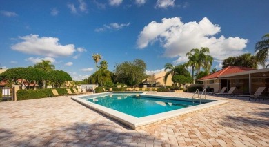 This charming 3-bedroom, 2.5-bathroom home with a tastefully on PGA National Golf Club in Florida - for sale on GolfHomes.com, golf home, golf lot