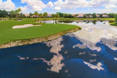 This charming 3-bedroom, 2.5-bathroom home with a tastefully on PGA National Golf Club in Florida - for sale on GolfHomes.com, golf home, golf lot