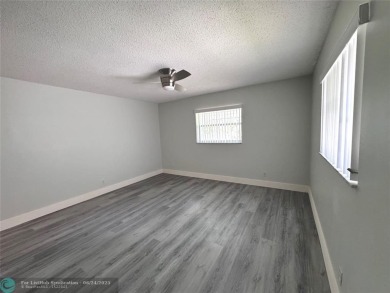 Welcome Home to this move-in ready 2-bed/ 2-bath home +bonus on Oriole Golf and Tennis Club in Florida - for sale on GolfHomes.com, golf home, golf lot