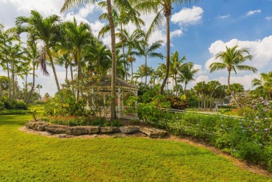 This charming 3-bedroom, 2.5-bathroom home with a tastefully on PGA National Golf Club in Florida - for sale on GolfHomes.com, golf home, golf lot