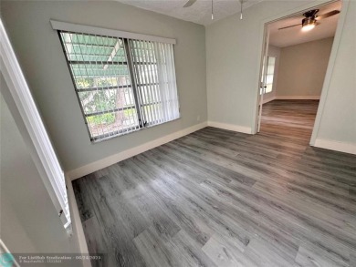 Welcome Home to this move-in ready 2-bed/ 2-bath home +bonus on Oriole Golf and Tennis Club in Florida - for sale on GolfHomes.com, golf home, golf lot
