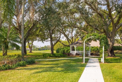 This charming 3-bedroom, 2.5-bathroom home with a tastefully on PGA National Golf Club in Florida - for sale on GolfHomes.com, golf home, golf lot