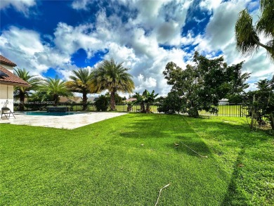 Cathedral Ceiling Single family Home for Sale located in the on Woodmont Country Club in Florida - for sale on GolfHomes.com, golf home, golf lot