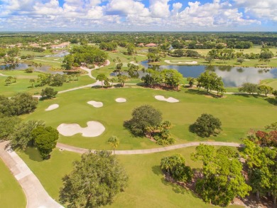 This charming 3-bedroom, 2.5-bathroom home with a tastefully on PGA National Golf Club in Florida - for sale on GolfHomes.com, golf home, golf lot