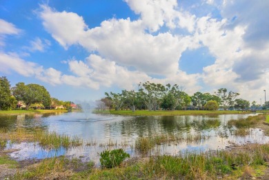 This charming 3-bedroom, 2.5-bathroom home with a tastefully on PGA National Golf Club in Florida - for sale on GolfHomes.com, golf home, golf lot