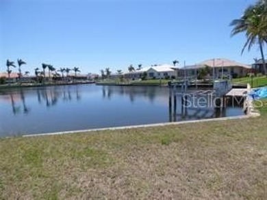 This beautiful Punta Gorda Isles gulf access waterfront lot with on Saint Andrews South Golf Club in Florida - for sale on GolfHomes.com, golf home, golf lot