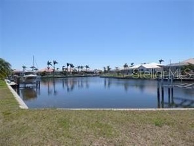 This beautiful Punta Gorda Isles gulf access waterfront lot with on Saint Andrews South Golf Club in Florida - for sale on GolfHomes.com, golf home, golf lot