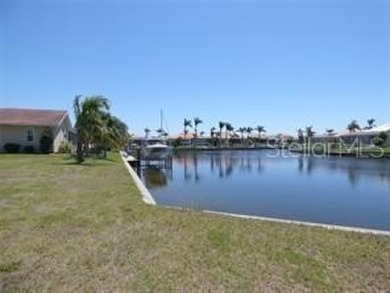 This beautiful Punta Gorda Isles gulf access waterfront lot with on Saint Andrews South Golf Club in Florida - for sale on GolfHomes.com, golf home, golf lot