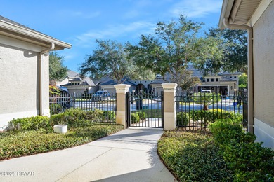 Discover the perfect blend of comfort, elegance, and Florida on Plantation Bay Golf and Country Club in Florida - for sale on GolfHomes.com, golf home, golf lot