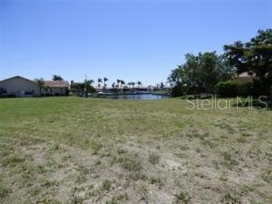 This beautiful Punta Gorda Isles gulf access waterfront lot with on Saint Andrews South Golf Club in Florida - for sale on GolfHomes.com, golf home, golf lot