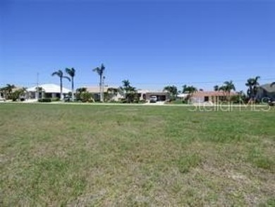 This beautiful Punta Gorda Isles gulf access waterfront lot with on Saint Andrews South Golf Club in Florida - for sale on GolfHomes.com, golf home, golf lot