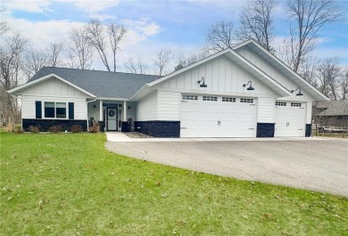 Experience upscale living at 30428 Suffolk Circle, a stunning on Breezy Point Golf Course Resort in Minnesota - for sale on GolfHomes.com, golf home, golf lot