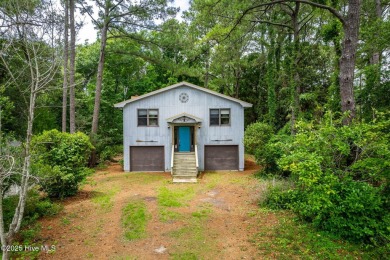 This 2-bedroom, 3-bath home, second row from the sound, offers a on The Country Club of the Crystal Coast in North Carolina - for sale on GolfHomes.com, golf home, golf lot
