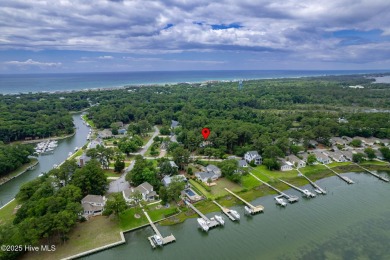 This 2-bedroom, 3-bath home, second row from the sound, offers a on The Country Club of the Crystal Coast in North Carolina - for sale on GolfHomes.com, golf home, golf lot