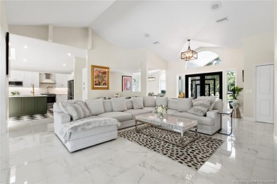 This 3BD, 2.5BA CBS pool home in Palm City is anything but on Evergreen Club in Florida - for sale on GolfHomes.com, golf home, golf lot