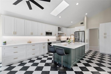 This 3BD, 2.5BA CBS pool home in Palm City is anything but on Evergreen Club in Florida - for sale on GolfHomes.com, golf home, golf lot