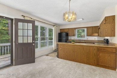 This 2-bedroom, 3-bath home, second row from the sound, offers a on The Country Club of the Crystal Coast in North Carolina - for sale on GolfHomes.com, golf home, golf lot