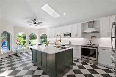 This 3BD, 2.5BA CBS pool home in Palm City is anything but on Evergreen Club in Florida - for sale on GolfHomes.com, golf home, golf lot